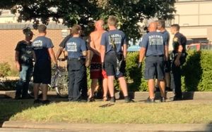 Shirtless Man Starts Downtown Brawl