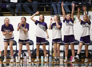 Lady Trojans dribble past the Knights 55-25