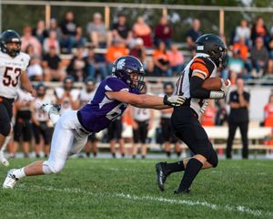 Trojans Stay Perfect Against Clay Center (Photo gallery)