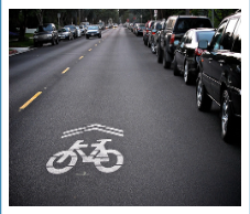 Bike Sharrows, New Carpet, & Budget on City Agenda