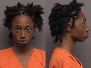 Woman Arrested After Man Stabbed with Scissors in Vehicle