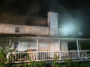 Deputy Rescues Couple From Roof During House Fire