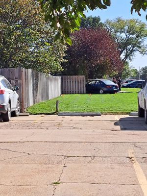 Vehicle Jumps Curb & Drives Into Fence