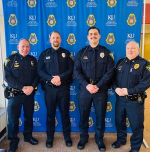 Officers Johnson & Fisher Graduate KLETC