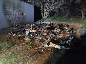 Suspicious Fire Engulfs Travel Trailer and Workshop on West North Street