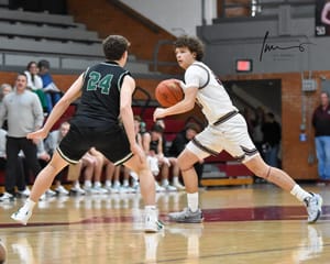 The Salina Central Mustangs Roll Past the DeSoto Wildcats in Round 1 of the Salina Invitational Tournament - Photo Gallery.
